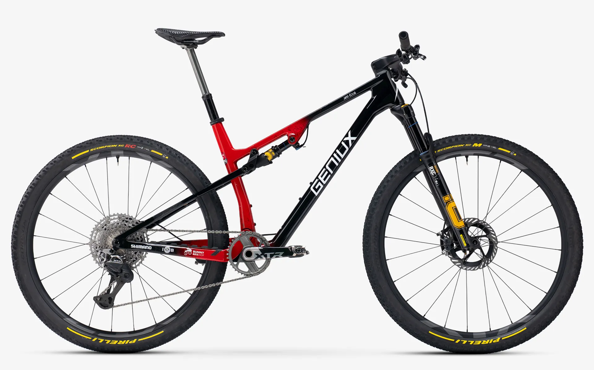 Bicicleta de montaña de carbono con doble suspensión Geniux Crest XC TEAM en vista lateral